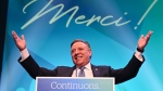 CAQ Leader Francois Legault makes his victory speech to supporters at the Coalition Avenir Quebec election night headquarters, in Quebec City, Monday, Oct. 3, 2022. THE CANADIAN PRESS/Jacques Boissinot