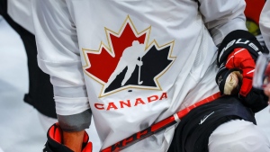 A Hockey Canada logo is shown on the jersey of a player with Canada’s National Junior Team during a training camp practice in Calgary, Aug. 2, 2022. THE CANADIAN PRESS/Jeff McIntosh