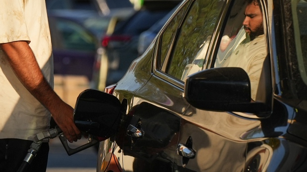 A motorist fuels up a vehicle at a Shell gas station on Saturday, October 1, 2022. THE CANADIAN PRESS/Darryl Dyck