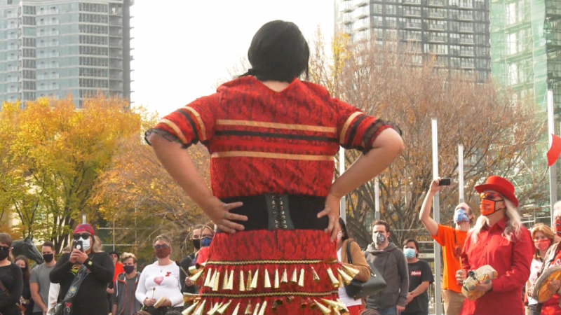 An Indigenous dancer in Calgary's municipal plaza during a rally honouring MMIWG. (file)