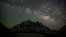 The Milky Way glows above the 6856 meters tall Bhagirathi peaks as seen from Tapovan, at an altitude of 4500 meters in the northern Indian state of Uttarakhand, Friday, May 10, 2019. (AP Photo/Altaf Qadri)