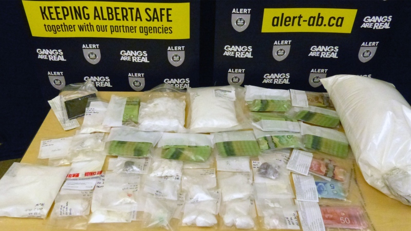 Drugs and cash seized in Fort McMurray. (Source: Alberta Law Enforcement Response Team)