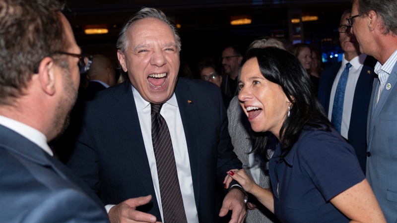 Coalition Avenir Quebec Leader Francois Legault shares a laugh with Montreal mayor Valerie Plante during a luncheon at the Quebec Union of Municipalities convention in Montreal, Friday, Sept. 16, 2022. THE CANADIAN PRESS/Paul Chiasson