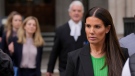 Rebekah Vardy departs the High Court in London, Thursday, May 19, 2022. A trial involving a social media dispute between two soccer spouses has opened in London. Rebekah Vardy sued for libel after Coleen Rooney accused her of sharing her private social media posts with The Sun newspaper. (AP Photo/Alastair Grant)