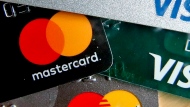 Mastercard and Visa credit cards are seen in Zelienople, Pa. in this Feb. 20, 2019. (AP Photo/Keith Srakocic, File) 