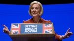 Britain's Prime Minister Liz Truss makes a speech at the Conservative Party conference at the ICC in Birmingham, England, on Oct. 5, 2022. (Kirsty Wigglesworth / AP)