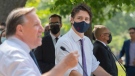 Prime Minister Justin Trudeau, right, and Quebec Premier Francois Legault, right, speak during a childcare funding announcement in Montreal, Thursday, August 5, 2021. THE CANADIAN PRESS/Graham Hughes