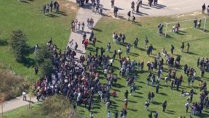 Students are seen outside Mayfield Secondary School after being evacuated on Oct. 5. (CTV News Toronto)