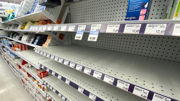 Empty shelves of children's pain relief medicine are seen at a Toronto pharmacy, Wednesday, August 17, 2022. (Joe O'Connal/CP)