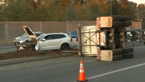A trailer being pulled by a dumptruck flipped and lost its load on Grandview Highway near Boundary Road on Oct. 5, 2022. 