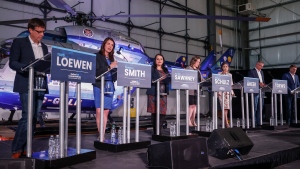Candidates, left to right, Todd Loewen, Danielle Smith, Rajan Sawhney, Rebecca Schulz, Leela Aheer, Travis Toews, and Brian Jean, attend the United Conservative Party of Alberta leadership candidate's debate in Medicine Hat, Alta., Wednesday, July 27, 2022 (The Canadian Press/Jeff McIntosh). 