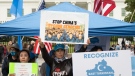 East Turkistan Awakening Movement holds a rally outside the White House against the Chinese Communist Party (CCP) to coincide with the 73rd National Day of the People's Republic of China in Washington, Oct. 1, 2022. They protest against alleged oppression by the Chinese government against Uyghurs and other mostly Muslim ethnic groups in far-western Xinjiang province. China's government has been accused of human rights abuses against Uyghurs and other predominantly Muslim minorities in the region. (AP Photo/Cliff Owen)