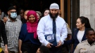 Adnan Syed, centre right, leaves the courthouse after the hearing, Monday, Sept. 19, 2022, in Baltimore. (Jerry Jackson/The Baltimore Sun via AP)