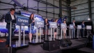 Candidates, left to right, Todd Loewen, Danielle Smith, Rajan Sawhney, Rebecca Schulz, Leela Aheer, Travis Toews, and Brian Jean, attend the United Conservative Party of Alberta leadership candidate's debate in Medicine Hat, Alta., Wednesday, July 27, 2022.THE CANADIAN PRESS/Jeff McIntosh
