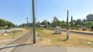 Railway tracks are seen at the intersection of Gladys and Essendene avenues in Abbotsford, B.C., in a Google Maps image captured in July 2022.
