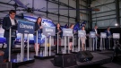 Candidates, left to right, Todd Loewen, Danielle Smith, Rajan Sawhney, Rebecca Schulz, Leela Aheer, Travis Toews, and Brian Jean, attend the United Conservative Party of Alberta leadership candidate's debate in Medicine Hat, Alta., Wednesday, July 27, 2022 (The Canadian Press/Jeff McIntosh).