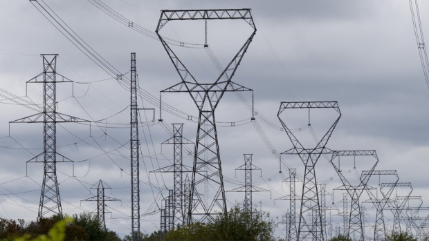 Power lines are seen against cloudy skies near Murvale, Ont., northwest of Kingston, Wednesday, Sept. 7, 2022 in Ottawa. THE CANADIAN PRESS/Adrian Wyld