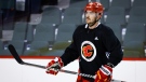 Calgary Flames defenceman Mackenzie Weegar skates during a training camp practice in Calgary, Alta., on Sept. 22. (THE CANADIAN PRESS/Jeff McIntosh)