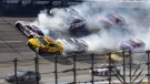 Alex Bowman (48), Joey Logano (22), Austin Cindric (2), Justin Allgaier (62) and Ty Gibbs (23) are involved in a crash in Turn 1 during a NASCAR Cup Series auto race Sunday, Oct. 2, 2022, in Talladega, Ala. (AP Photo/Skip Williams)