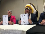 Corrections, Policing and Public Safety minister Christine Tell and Saskatoon Tribal Council Tribal Chief Mark Arcand
