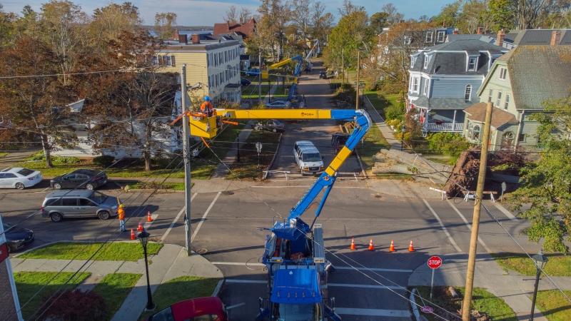 A utility crew works on a power pole in downtown Charlottetown, P.E.I. (Courtesy: Cloudcam Aerials) 