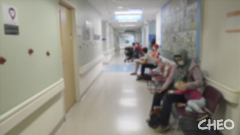 CHEO released a video on Friday showing patients and parents waiting in the hallways of the emergency department. (CHEO/Vimeo) 