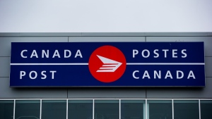 The Canada Post logo is seen on the outside the company's Pacific Processing Centre, in Richmond, B.C., on June 1, 2017. Canada Post is now offering loans alongside stamps and packaging as it officially launches a partnership with TD Bank Group. THE CANADIAN PRESS/Darryl Dyck