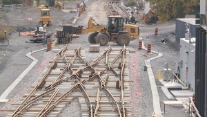 Crews installing tracks on O-Train Line 2, part of LRT Stage 2, Oct. 12, 2022. Line 2, a.k.a. the Trillium Line, is up to a year behind schedule. (Chris Black/CTV News Ottawa)