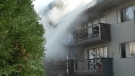 Fire crews in Burnaby battled a blaze at an apartment building that sent at least two people to hospital on October 13, 2022.(Photo: Jordan Jiang / CTV Vancouver).