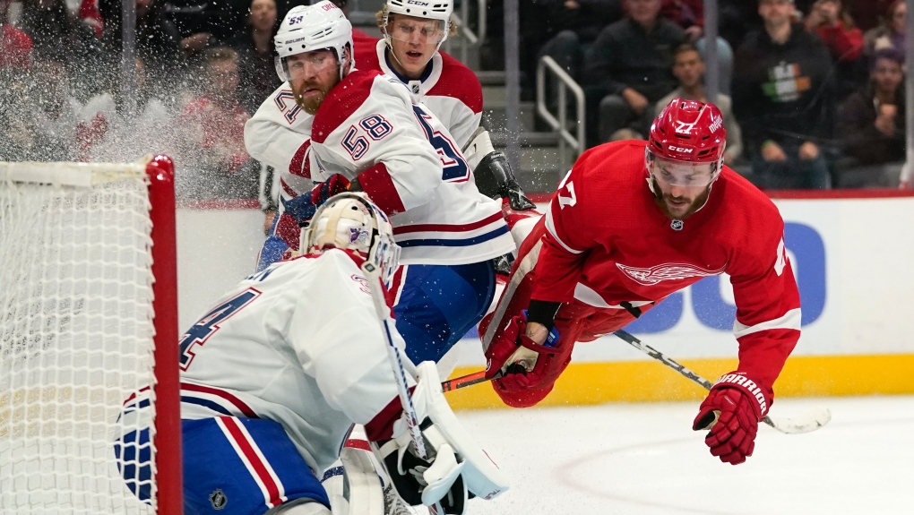Montreal Canadiens' David Savard (58) tries to block New Jersey