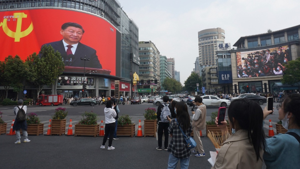Chinese President Xi Jinping on a screen, Hangzhou