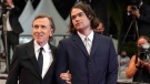 Tim Roth, left, and his son Cormac Roth appear at the 74th international film festival in Cannes, on July 11, 2021. (AP Photo/Brynn Anderson, File)