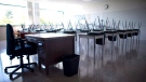 A empty teacher's desk is pictured in an empty classroom at Mcgee Secondary school in Vancouver on Sept. 5, 2014. A major union representing education workers in Ontario says its members have voted overwhelmingly in favour of a potential strike that could take effect by the end of the month. THE CANADIAN PRESS/Jonathan Hayward