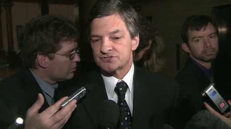 Ontario Attorney General Chris Bentley speaks with reporters from Queen's Park in Toronto, Wednesday, Jan. 13, 2010.