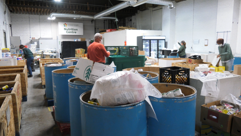 Volunteers pack food hampers in the Saskatoon Food Bank nutrition centre. (John Flatters/CTV News)