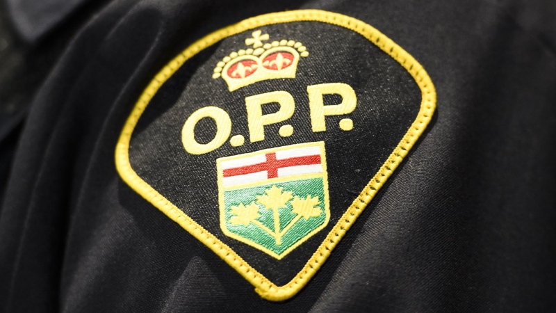 An Ontario Provincial Police logo is shown during a press conference in Barrie, Ont., Wednesday, April 3, 2019. THE CANADIAN PRESS/Nathan Denette
