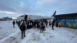 The Winnipeg Blue Bombers boarding a plane to Regina as they get ready for their third straight Grey Cup appearance. Nov. 15, 2022. (Source: Jamie Dowsett/CTV News)