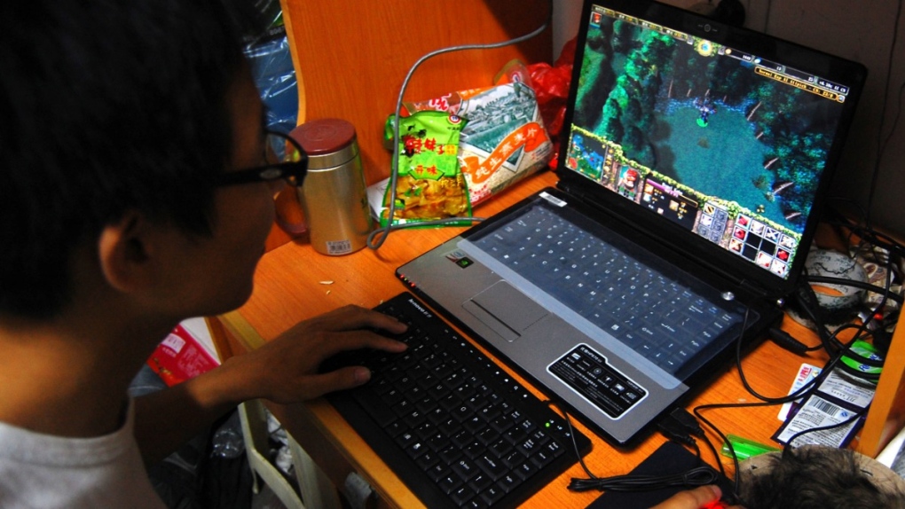Playing World of Warcraft Chongqing city, China