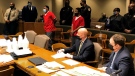 From left, Justin Johnson and Cornelius Smith appear before a judge during a court hearing related to the fatal shooting of rapper Young Dolph on Friday, Feb. 11, 2022, in Memphis, Tenn. Lawyers for Johnson and Smith said their clients were not guilty during a Friday hearing. Johnson and Smith were indicted in January in the Nov. 17 killing of Young Dolph, whose real name was Adolph Thornton Jr. (AP Photo/Adrian Sainz).