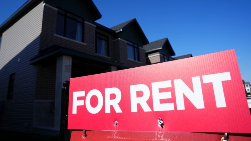 A for rent sign is displayed on a house in a new housing development in Ottawa, Oct. 14, 2022. THE CANADIAN PRESS/Sean Kilpatrick