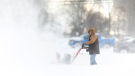 A man uses a snowblower in Fort Erie, Ont., during an early winter storm that delivered high winds and large amounts of snow across southern Ontario and western New York, Saturday, Nov. 19, 2022. THE CANADIAN PRESS/Nick Iwanyshyn 