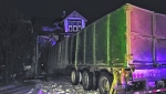 A semi truck and trailer hit a house near Onoway, Alta., on November 20, 2022. Emergency crews found the driver dead inside the vehicle (Source: RCMP.)