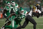 Hamilton Tiger-Cats wide receiver Brandon Banks (16) runs the ball past Saskatchewan Roughriders defensive back A.J. Hendy (35) during the first half of CFL football action in Regina on Saturday, August 14, 2021. THE CANADIAN PRESS/Kayle Neis