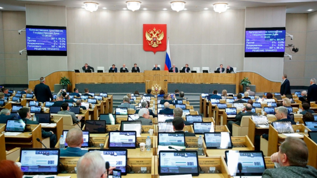Russian lawmakers attend a State Duma session