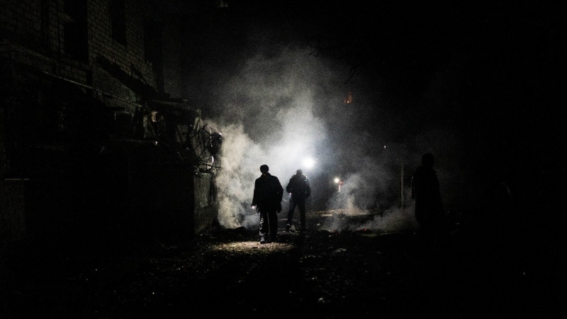 A resident walks amid debris after a Russian attack in Kherson, southern Ukraine, on Nov. 24, 2022. (Bernat Armangue / AP) 