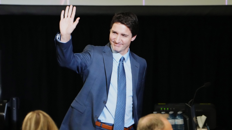 Prime Minister Justin Trudeau waves to a supporter as he leaves after appearing as a witness at the Public Order Emergency Commission in Ottawa, Friday, Nov. 25, 2022. THE CANADIAN PRESS/Sean Kilpatrick