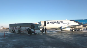 The University of Saskatchewan Huskies football team boards its chartered flight to London, Ont. on Wednesday. (Miriam Valdes-Carletti/CTV News)