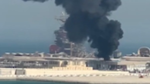 Video shows black smoke rising out of a building and into the sky in Lusail, Qatar, near of the World Cup fan village on Nov.26. 