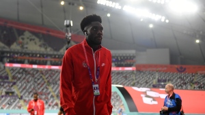 Alphonso Davies of Canada inspects the pitch prior to the FIFA World Cup Qatar 2022 Group F match between Croatia and Canada at Khalifa International Stadium on Nov. 27, 2022 in Doha, Qatar. (Photo by David Ramos/FIFA via Getty Images)