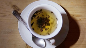 This photo shows a cup of black tea with a spoon and tea leaves in London, Monday, Aug. 29, 2022. According to a large study of British tea drinkers published Monday in Annals of Internal Medicine, scientists found two or more cups daily was tied with a modest benefit: a 9% to 13% lower risk of death from any cause. (AP Photo/Alastair Grant)